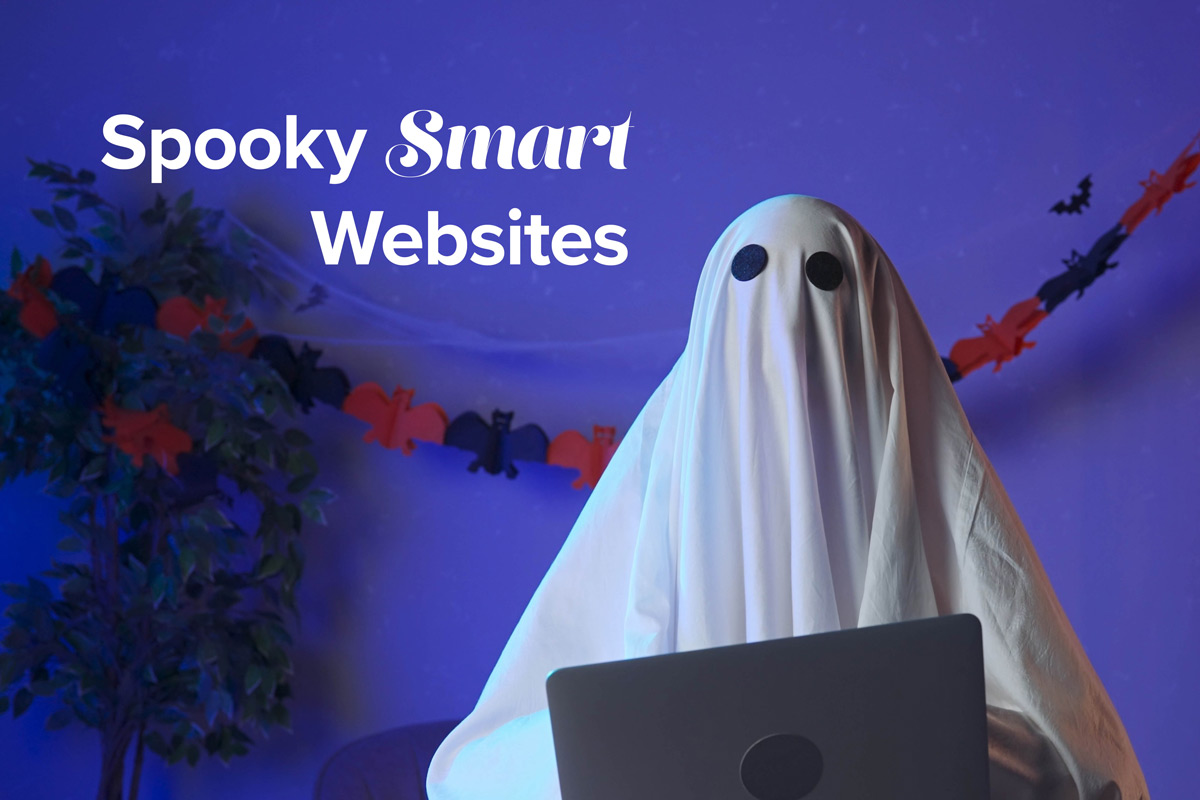 October 2025 LKF Marketing Industry Insight, Spooky Smart Websites shows a person working on a laptop with a white sheet over their head to look like a ghost. The room is a deep purple to give a Halloween feel.
