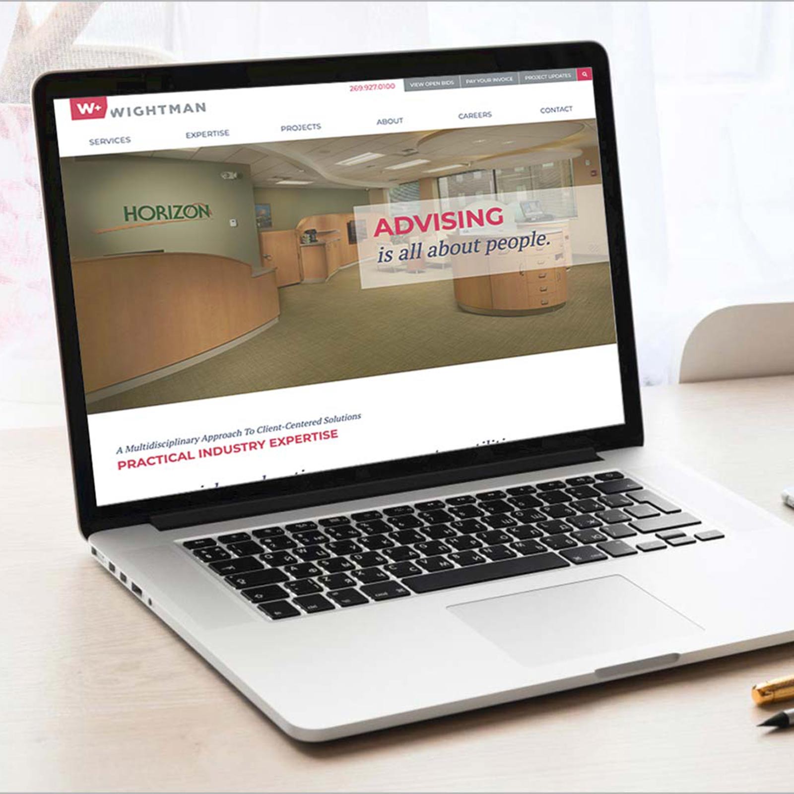 Wightman Website shown on laptop